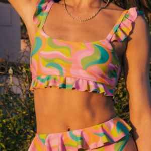 Show me your mumu swim tank with ruffle.  Good condition.